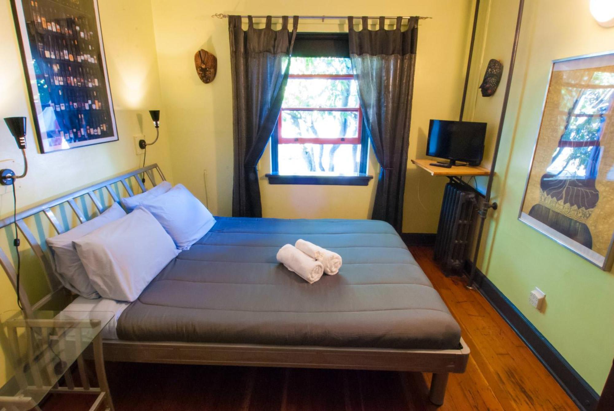 Ocean Island Inn | Backpackers | Suites Victoria Rum bild